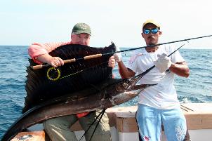 Chuck Laughridge with Guatemalan fly caught Sailfish at the Sailfish School