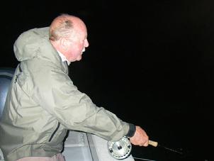 Ken Haupt fighting night time Tarpon on Fly