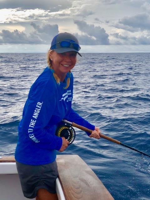 Wanda Hair Taylor winding in her 200+ pound Blue Marlin on Fly aboard "Dragin Fly" Jake Jordan Photo 