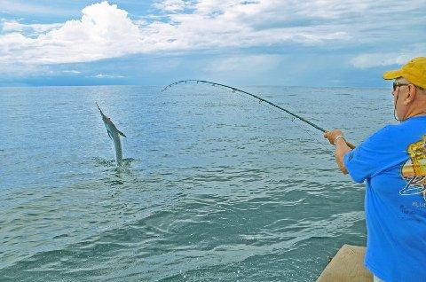Jake Jordan releasing one of 18 Blue Marlin he caught on fly during his 2014 summer season at the "Costa Rica, Blue Marlin Fly Fishing School" aboard th evessel Dragin Fly, Los Suenos Costa Rica, June, July, and August, of 2014