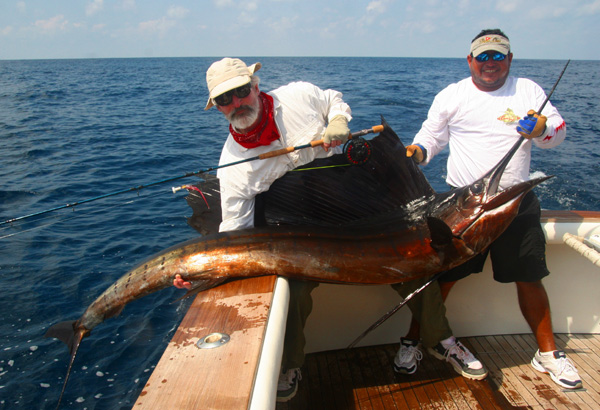 James Garrity and mate Jeffrey releasing first Sailfish on Fly at The Sailfish School in Guatemala, March 2009