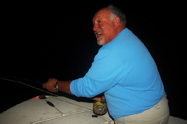 Ric Cox fighting big Florida Keys Tarpon on Fly Captain Jake Jordan