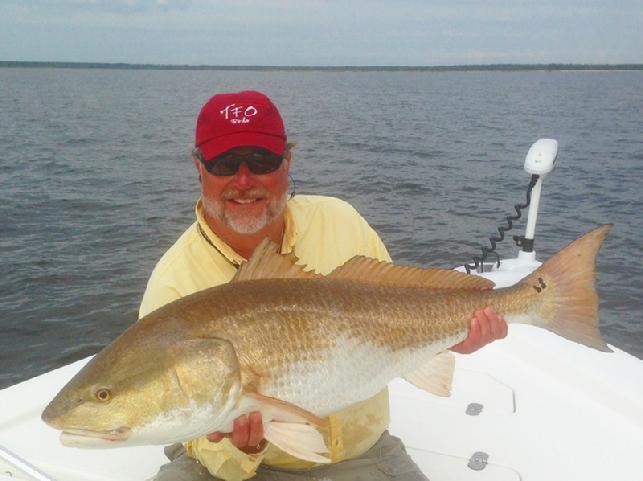 Captain Gary Dubiel, Releasing Neuse River Redfish, September 2013, Captain Jake Jordan Photo