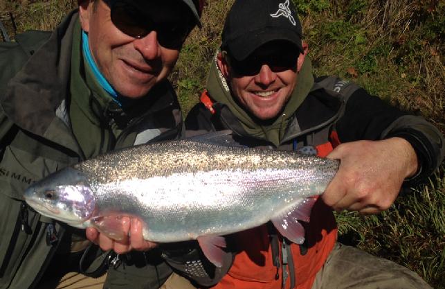 Gerry Wendrovsky releases 9 pound RAinbow trout, JD Stanley guide, 