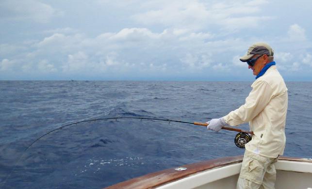 Guy hooked up to one of the 7 Blue Marlin, which he caught on fly, at my, The Blue Marlin Fly Fishing School, aboard the vessel "Dragin Fly", July 2015