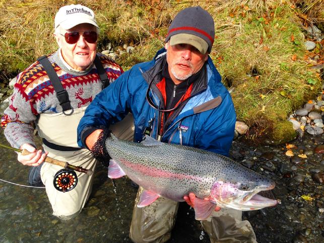 Nick Smith 31 inch Kenai Rainbow Trout on fly, Tony Weaver releasing awesome fish, Jake Jordan Photo, September 2016