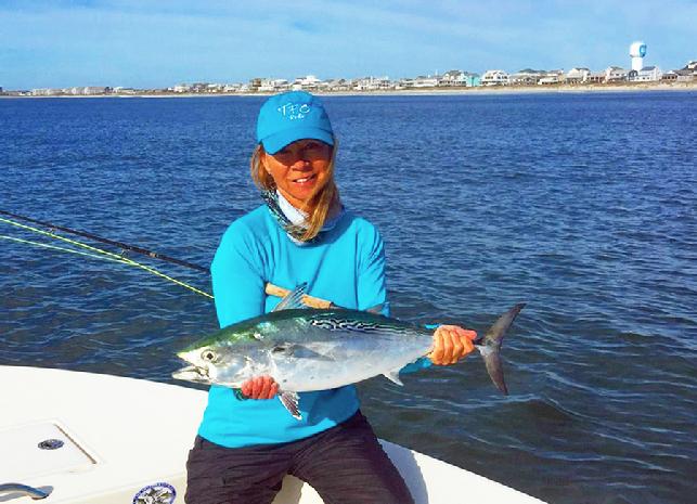 Wanda Hair Taylor, releasing Albie, Cape Lookout Albacore Festival, 2015, Vessel Fly Reel, Captain Jake Jordan Photo